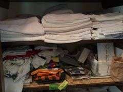 Top 3 shelves includes blankets, towels, hand towels, etc