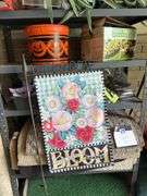 Shelf and all includes many rugs, electric leaf blower, yard flags, lawn edging, yaktrax