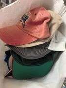 Tote with ball caps, single wine bottle carriers, water bottles, tennis rackets, LED shoe lights, etc