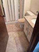 Contents of two baths includes cleaning supplies, bandaids, scales, rugs, etc