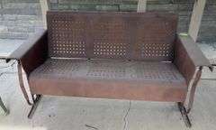Vintage metal patio glider 56" wide. A classic!