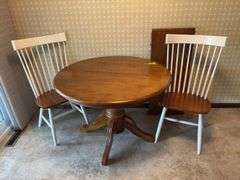 42” round dining table w 18” leaf and two chairs