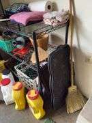 Wire shelf unit and contents includes drop cords, decor, cord wraps, cat litter, Preen, etc