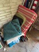 In corner includes US flag, trap, chair cushions, window scrapers , yard tools, 5’ wooden painters ladder
