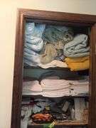 Top 3 shelves includes blankets, towels, hand towels, etc