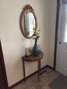 Half moon table, wall mirror and decor