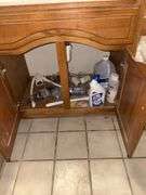 Contents of bathrooms includes (2) two  drawer cabinets, cleaning supplies, paper products, etc