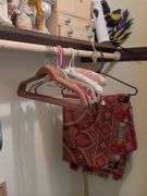 Contents of bedroom 1 closet include holiday decor, empty jewelry box, hangers, etc The white boxes are empty!