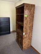 18D x 31L x 75H bookcase with three shelves and double door lower storage