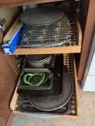 Kitchen linens, bags, baking pans, wire racks “D” cupboards