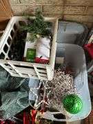 Christmas tree in bag, wreathes, lights, etc