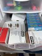 Many office supplies-paper, binder clips, paper clips, ink cartridges, etc
