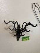 Cast iron folding wall mount coat rack and rug beater