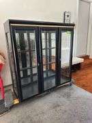 Lighted black hutch top with glass shelves 17D x 48L x 50H Glass shelves are wrapped in house