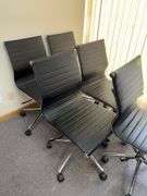 Five rolling adjustable height office chairs, see photos for condition