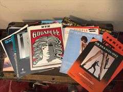 Sheet music and variety of music books, music stand