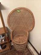 Fan back wicker chair and throw pillow
