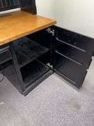 24D x 68L x 72H two piece credenza with hutch on top Has flip down keyboard tray, three drawers on left side and single door on right . Matches desk in lot 11487