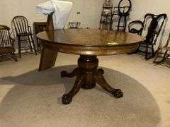 48” round oak table w/ (2) 12" leaves
