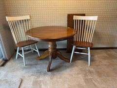 42” round dining table w 18” leaf and two chairs