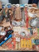 4 x 8 sheet of plywood full of tools and household maintenence items