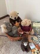 Children’s books and a basket of stuffies