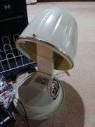 Luggage, retro hairdryer, landline phone, fish bowl, shoe rack, etc