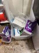 Cleaning supplies, luggage, hangers, paper items, small shelf, laundry soap and more