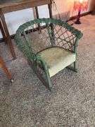 Doll crib, green wicker doll rocker, child’s table and chair