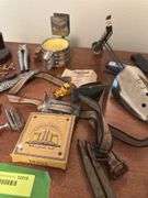 Assorted smalls includes merscham style pipe, ice cleats, pocket knives, old razor, bullets, gal on leg nut cracker, ash tray set w/matching holder and more