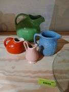 Pottery pitchers