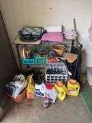 Wire shelf unit and contents includes drop cords, decor, cord wraps, cat litter, Preen, etc