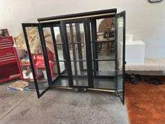 Lighted black hutch top with glass shelves 17D x 48L x 50H Glass shelves are wrapped in house