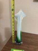 Jack in the Pulpit style glass stretch vase and genuine plastic flowers, not imitation plastic but genuine!!!