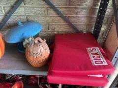 Shelf and all includes holiday decor, stadium cushions, bird feeder, outside entry mats, etc
