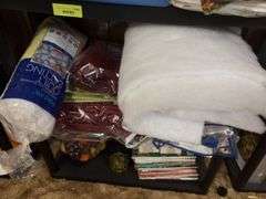 Shelf and all includes placemats, cookie jar, quilt batting, etc