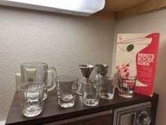 Sony radio, bar guide, car planter,  shot glasses, etc