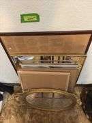 Wall mirror, cork boards, framed poster, etc