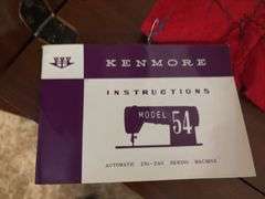 Sears Kenmore sewing machine in cabinet Model 54