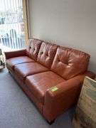 82” long Ashley three cushion sofa