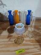 Colored glass bottles, flower frogs etc...