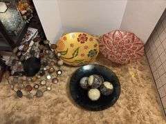 Four art deco bowls and balls to put in them