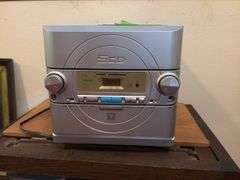Trutech 5 cd player/AM/FM, speakers and stand.