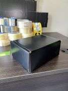 Quantity of Staples brand packing tape, dispensers, boxes, 500’ roll CAUTION tape