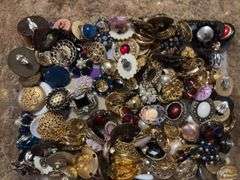 12” round mirrored footed dresser tray and large quantity of brooches, shoe clips for crafting