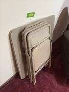 Four Cosco folding chairs and matching table