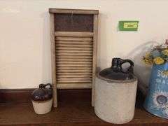 Metal washboard, 2 crock jugs and decorator sprinkling can