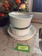 Various fruit decor and three casserole dishes