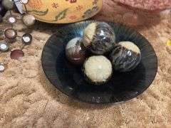 Four art deco bowls and balls to put in them