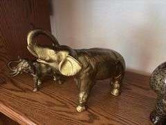 Ceramic and heavy brass elephants